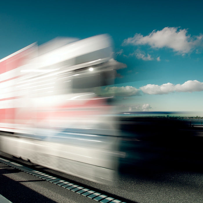 a moving vehicle on the bridge